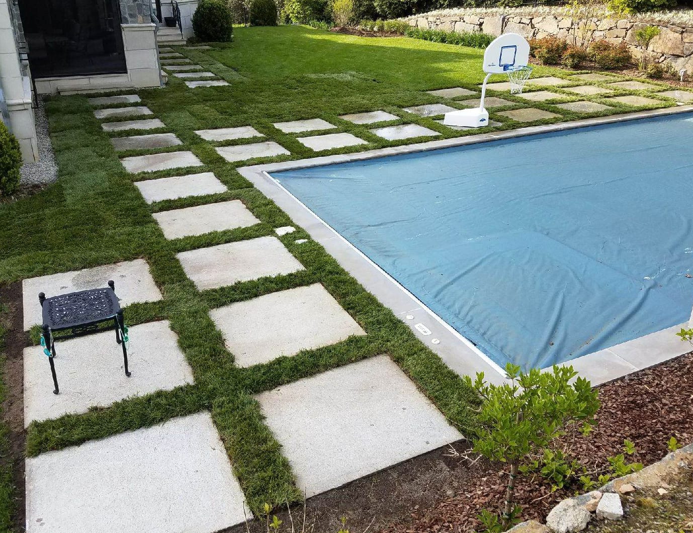 Stone-Curators-Oversized-reclaimed-granite-pool-surround