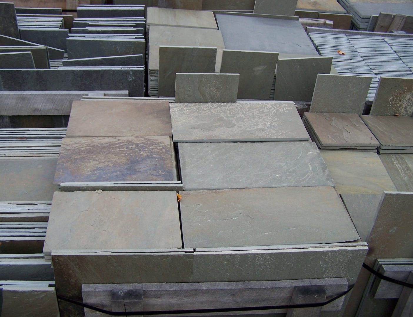 Stone-Curators-Bluestone-full-color-dimensional-cut-pavers-in-pallets