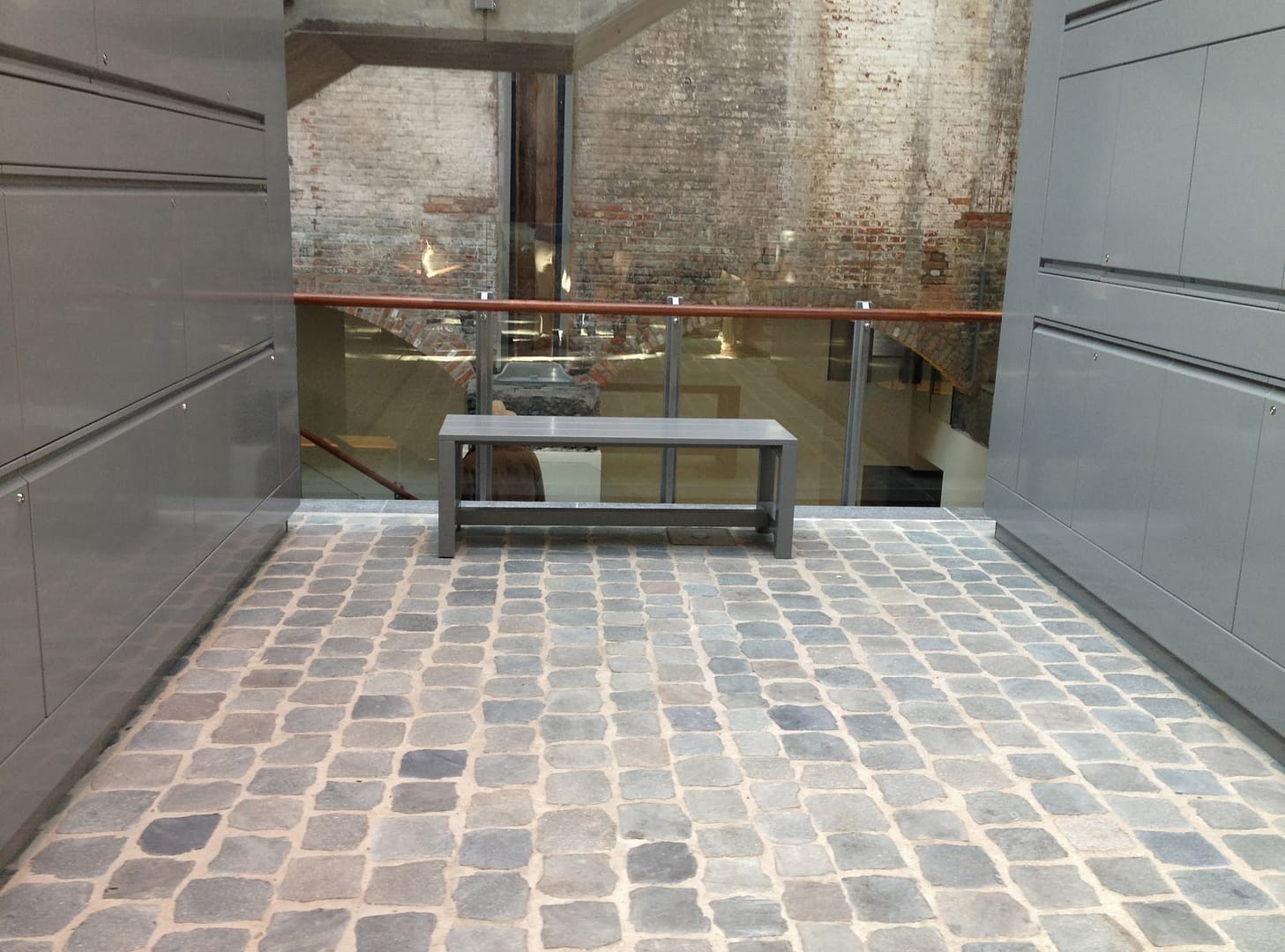 Reclaimed European porphyry sliced cobblestone interior floor - Stone Curators