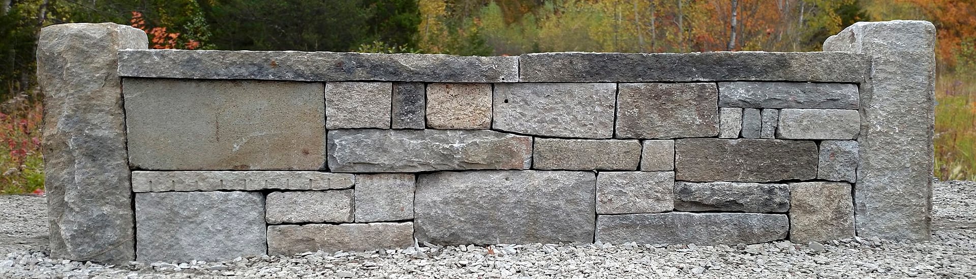 Reclaimed granite mock-up of wall