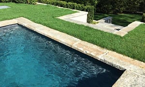 Reclaimed granite curbstone pool coping