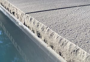 Stone-Curators-Bluestone-rockfaced-pool-coping-edge-D6DC7E4E653E-crop