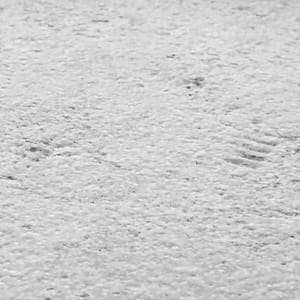 Antiqued natural stone surface finish example in grayscale