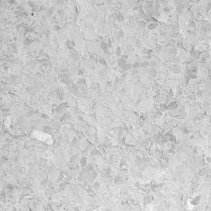 Flamed natural stone surface finish example in grayscale
