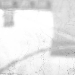 Polished natural stone surface finish example in grayscale