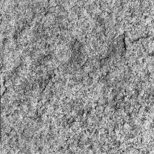 Weathered natural stone surface finish example in grayscale