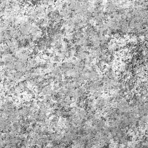 Worn natural stone surface finish example in grayscale