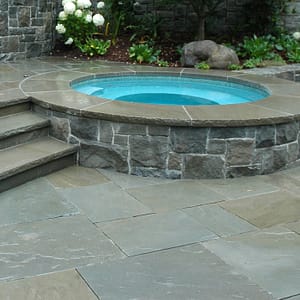 Stone-Curators-Bluestone-hot-tub-coping-and-paving