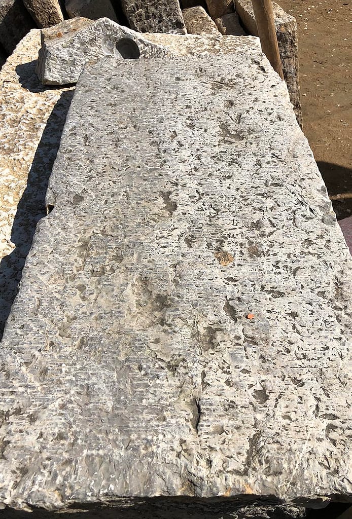 Reclaimed-limestone-plank-paver-material-closeup-890x1314-1