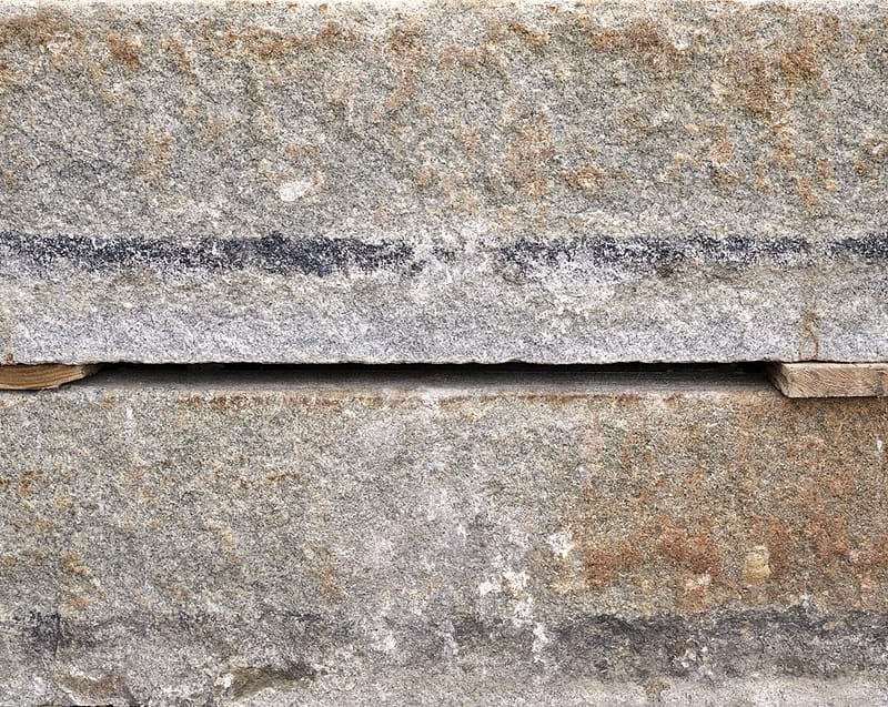 Reclaimed-third-generation-granite-curbstone-plank-material-1080x860-1