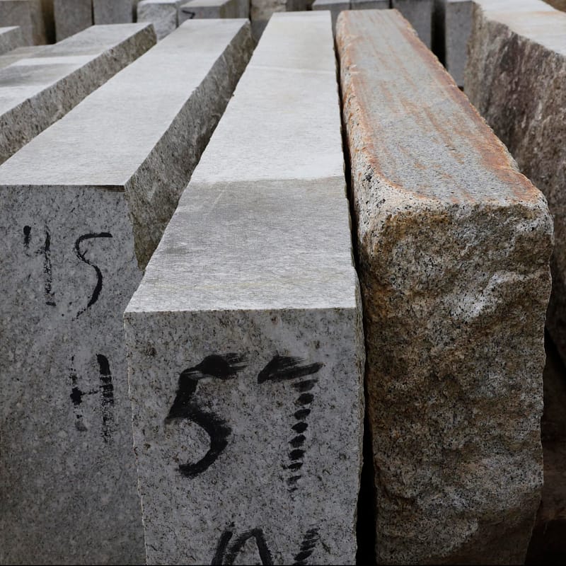 stone_curators-reclaimed_third_and_second_generations_of_granite_curbstone