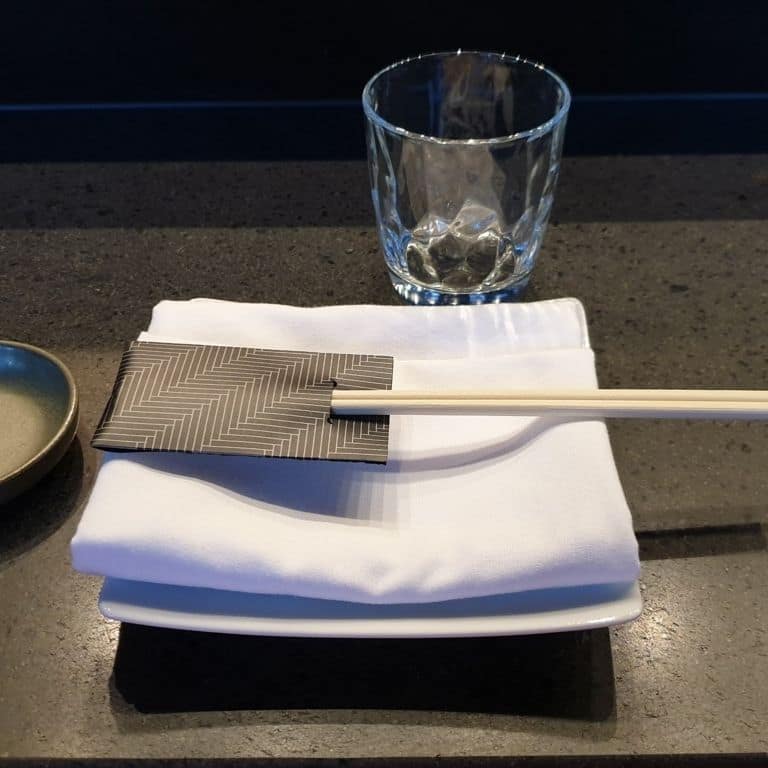 Application image for Basalt - Basalto. The image shows this material being used in a countertop slabs application. The dominant color shown is black. The color mix creates a cool feeling.