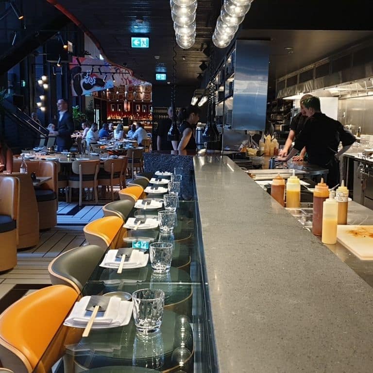 Application image for Basalt - Basalto. The image shows this material being used in a countertop slabs application. The dominant color shown is black.