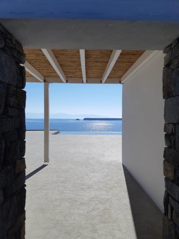 Application image for Limestone - Veneto Olivo. The image shows this material being used in a pool deck pavers application. The surface finish shown is flamed. The dominant color shown is gray. The color mix creates a cool feeling.