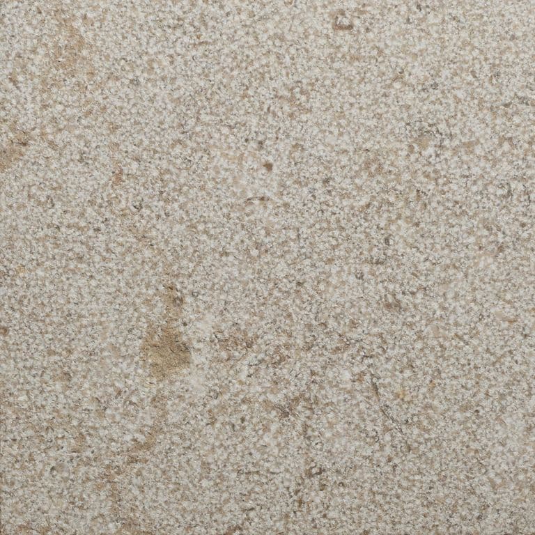 Color/Finish variation image for Veneto Beige Limestone. The surface finish shown is bush hammered. The dominant color shown is cream. The color mix creates a warm feeling.