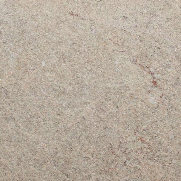 Swatch image for Veneto Rosato Limestone. The surface finish shown is flamed. Dominant colors shown are beige and cream. The color mix creates a warm feeling.