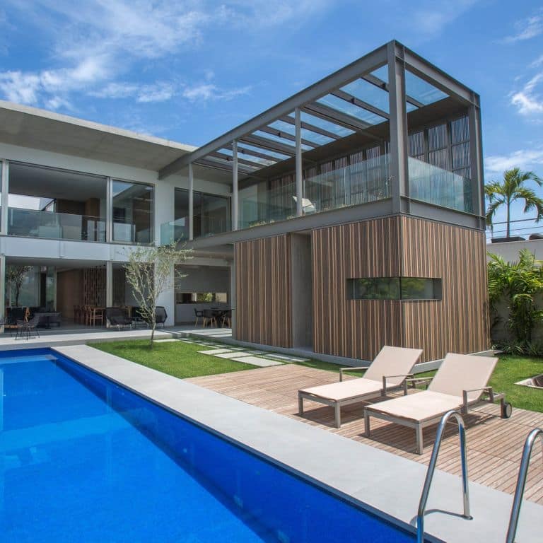 Feature image for Sandstone - Pietra Forte Fiorentina. The image shows this material being used in a pool coping application. The surface finish shown is honed. Dominant colors shown are gray, pink and white. Solid color pattern.