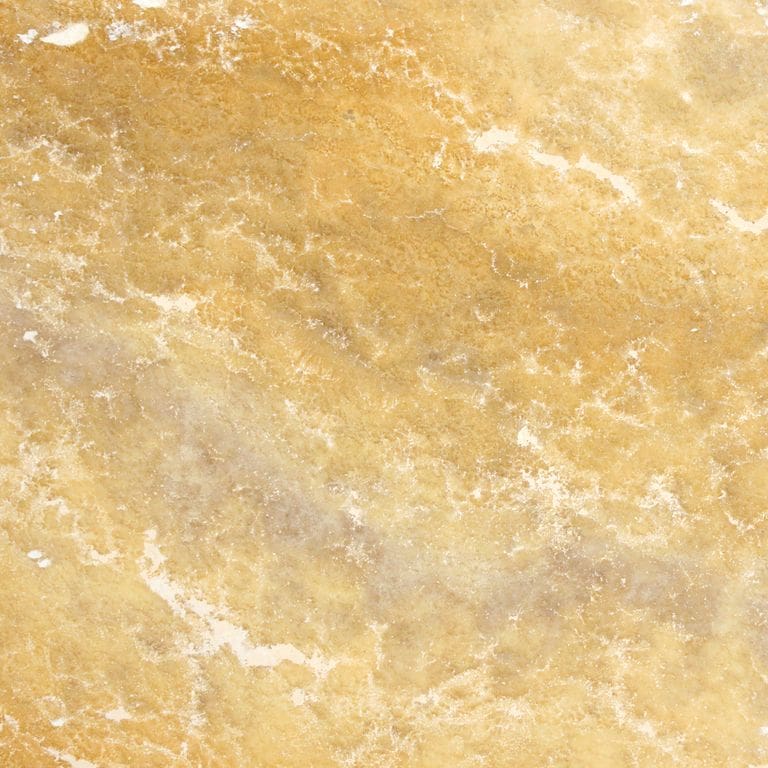 Feature image for Scabos® Travertine. The surface finish shown is tumbled. Dominant colors shown are orange/rust and tan. Exhibits "movement" and the color mix creates a warm feeling. Marbled color pattern.
