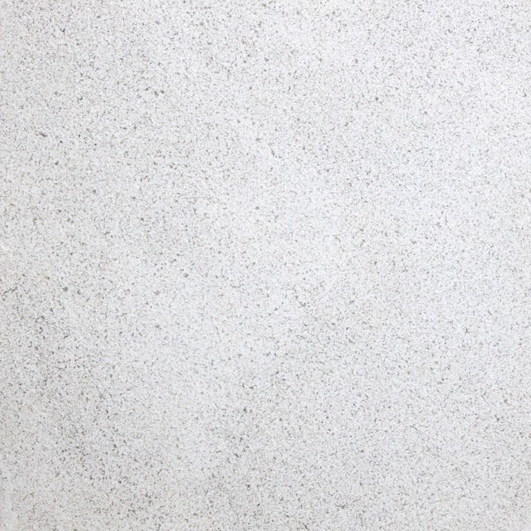Feature image for Mountain Smoke® Marble. The surface finish shown is sand blasted. Dominant colors shown are gray and white. The color mix creates a cool feeling. Regular and fine speckled color patterns.