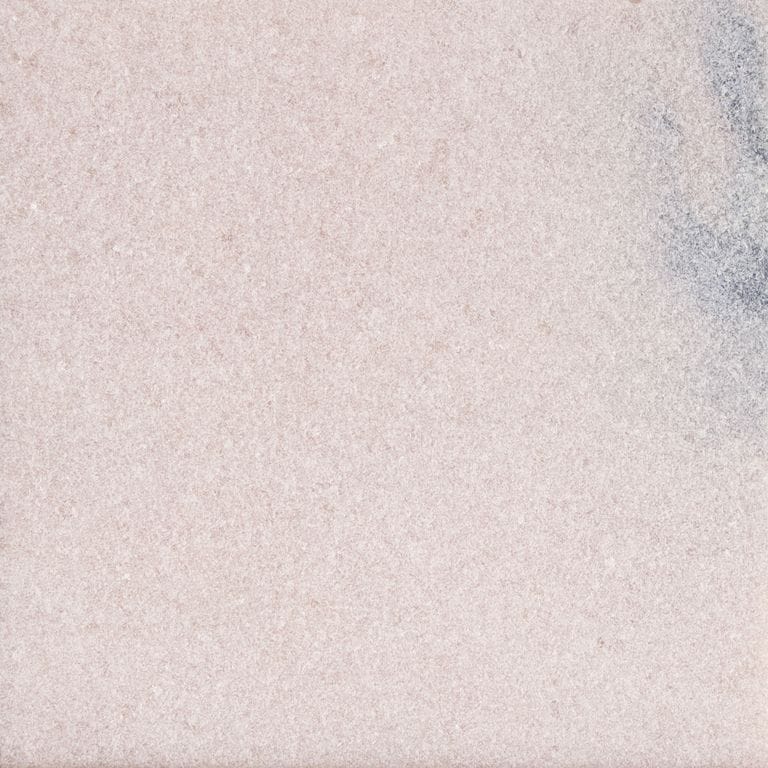 The surface finish shown is sand blasted. Dominant colors shown are beige and white. The color mix creates a cool feeling. Solid and regular color patterns.