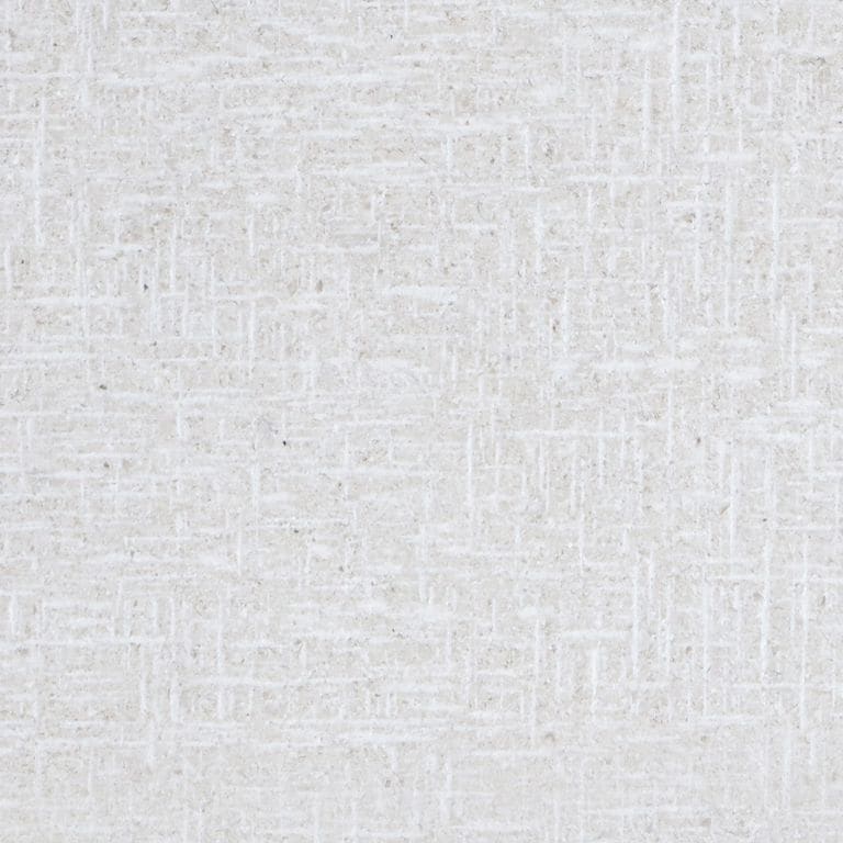 Feature image for Fino Limestone. The surface finish shown is scratched. Dominant colors shown are gray, white and cream. The color mix creates a cool feeling. Solid color pattern.