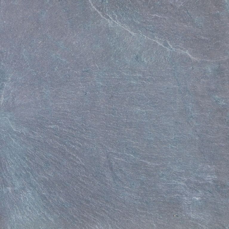 Feature image for Mottled Green Purple Slate. The surface finish shown is natural cleft. Dominant colors shown are blue and gray. The color mix creates a cool feeling. Regular color pattern.