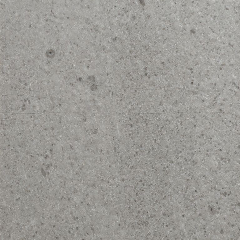 Color/Finish variation image for Northern Bay Limestone. The surface finish shown is acid washed. The dominant color shown is gray. The color mix creates a cool feeling.