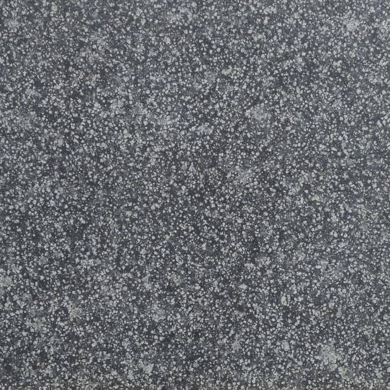 Color/Finish variation image for Basalt - Flor De Camomila. The surface finish shown is honed. The dominant color shown is gray. The color mix creates a cool feeling.