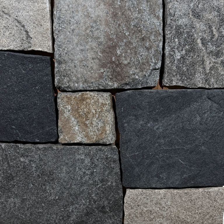 Color/Finish variation image for Windsor Granite Thin Veneer. The surface finish shown is split-face. Dominant colors shown are black and gray.