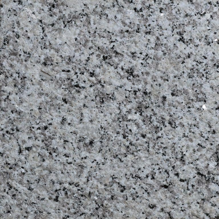 Color/Finish variation image for Granite - Salt &amp; Pepper. The surface finish shown is bush hammered. The dominant color shown is gray. The color mix creates a cool feeling.