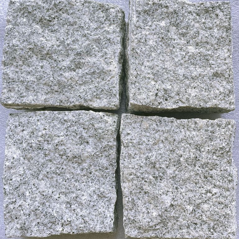Feature image for Salt &amp; Pepper Granite. The surface finish shown is split-face with flat plane. Dominant colors shown are blue and gray. The color mix creates a cool feeling. Fine speckled color pattern.