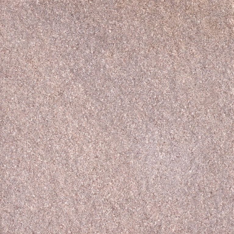 Feature image for Capsic Pink Sandstone. The surface finish shown is sand blasted. Dominant colors shown are beige and tan. The color mix creates a warm feeling. Solid color pattern.