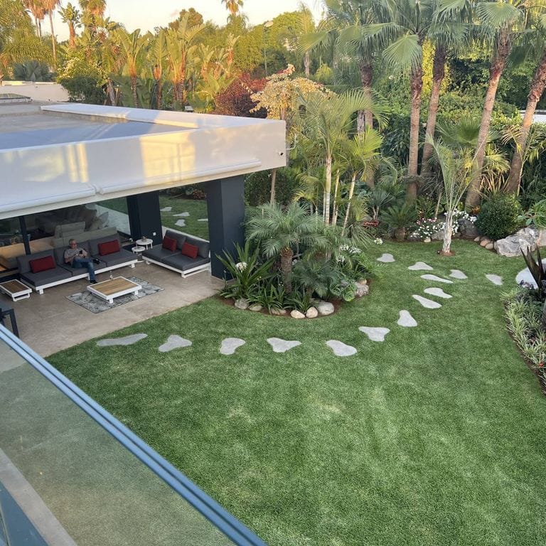 Application image for Limestone - Rabat Beige. The image shows this material being used in a patio pavers application. The surface finish shown is brushed. The dominant color shown is tan. The color mix creates a warm feeling.