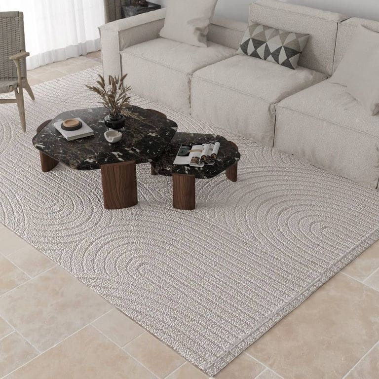 Application image for Limestone - Meknes Beige. The image shows this material being used in an interior floor application. Dominant colors shown are beige, gray and tan. The color mix creates a warm feeling.