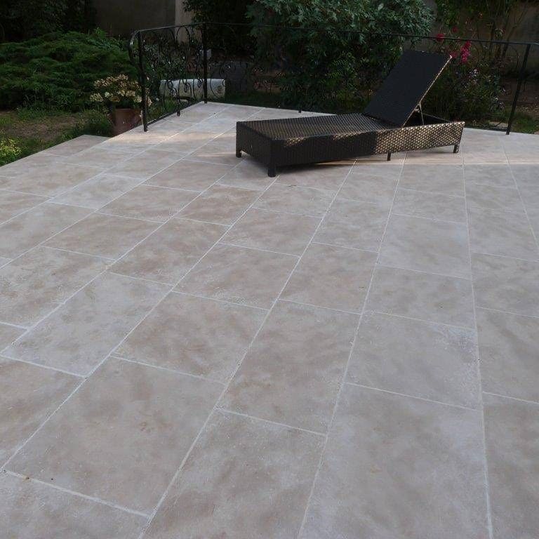 Application image for Meknes Beige Limestone. The image shows this material being used in a patio pavers application. The dominant color shown is beige. The color mix creates a warm feeling.