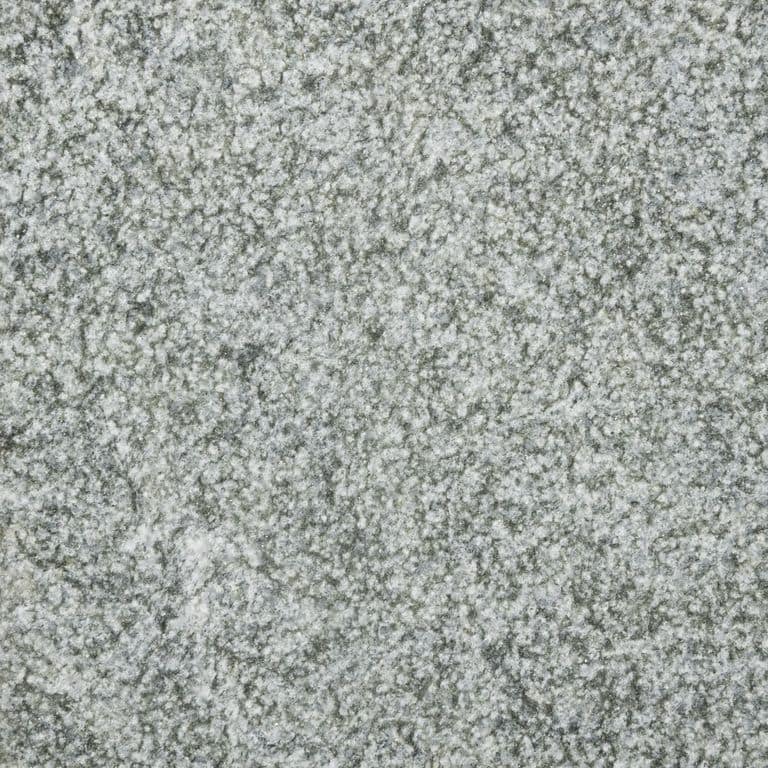 Color/Finish variation image for Granite - Nebbia Grigia. The surface finish shown is bush hammered. The dominant color shown is gray. The color mix creates a cool feeling.