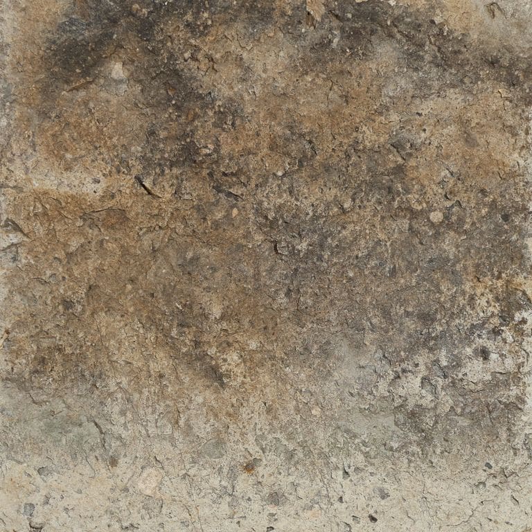 Color/Finish variation image for Reclaimed Tuff Stone. The surface finish shown is split-face. The dominant color shown is brown. The color mix creates a warm feeling.