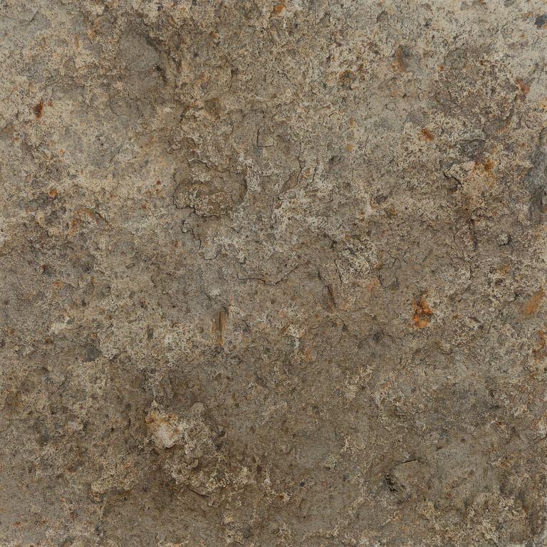 Color/Finish variation image for Reclaimed Tuff Stone. The surface finish shown is split-face. The dominant color shown is brown. The color mix creates a warm feeling.