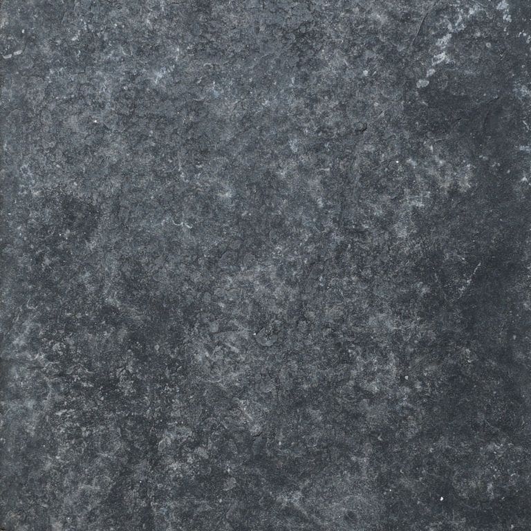 Color/Finish variation image for Jade Black Limestone. The surface finish shown is flamed. Dominant colors shown are black and gray. The color mix creates a cool feeling.