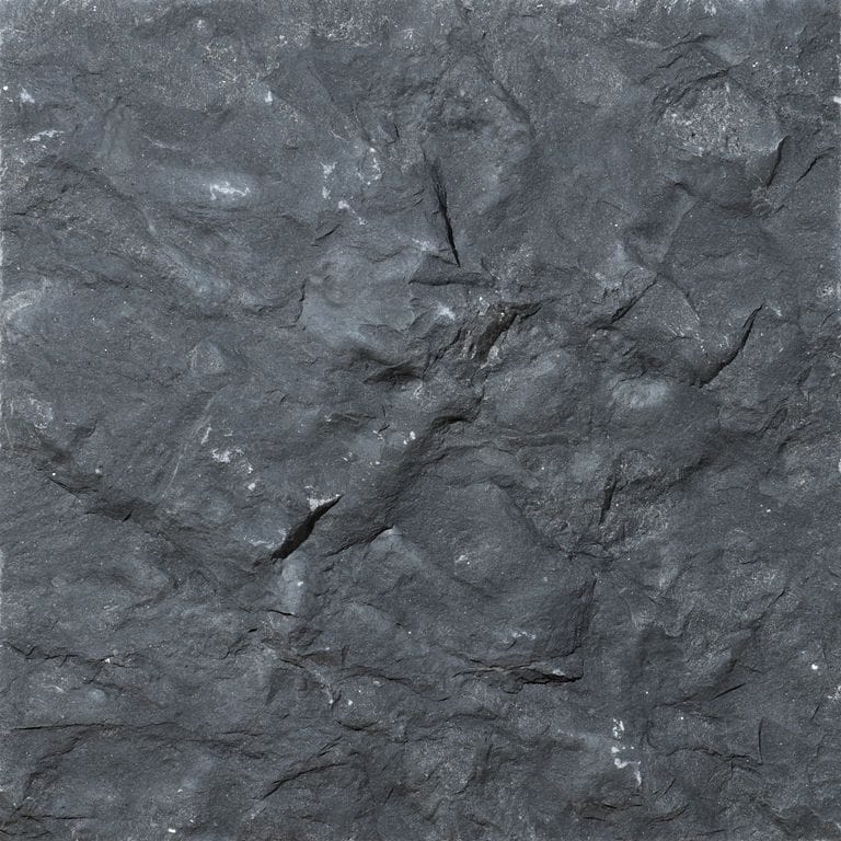Color/Finish variation image for Jade Black Limestone. The surface finish shown is split-face. Dominant colors shown are black and gray. The color mix creates a cool feeling.