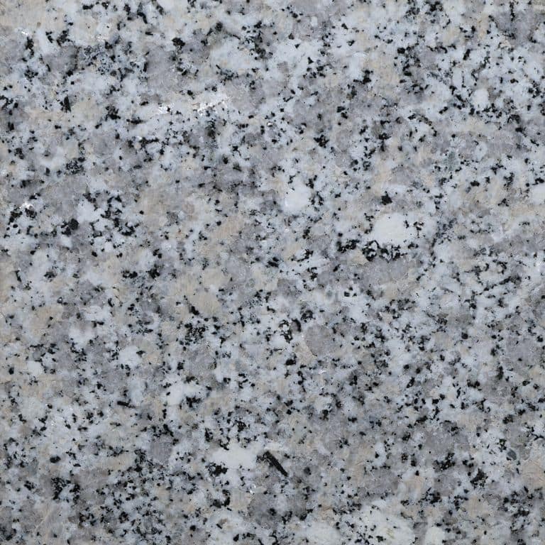 Color/Finish variation image for Superior Snow Granite. The surface finish shown is honed. Dominant colors shown are gray and white. The color mix creates a cool feeling.