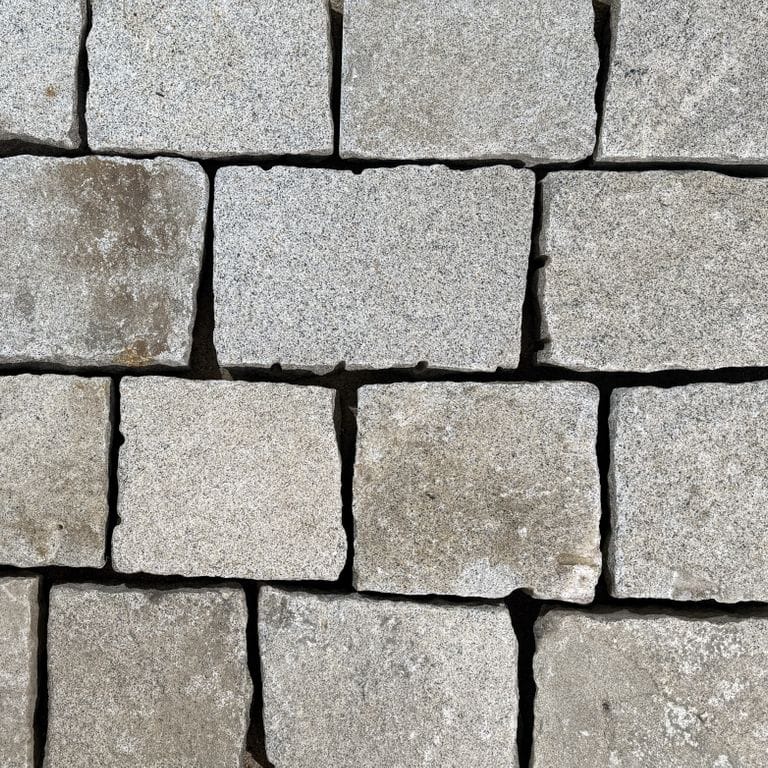 Color/Finish variation image for Reclaimed New England Bridge Squares. The surface finish shown is . Dominant colors shown are gray and greige. The color mix creates a warm feeling.