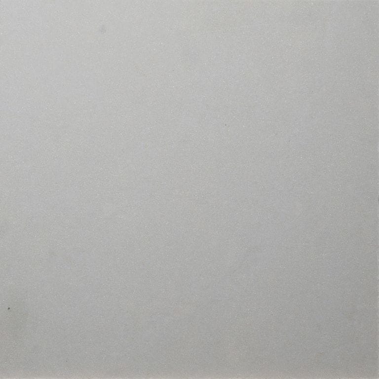 Color/Finish variation image for Dovewhite Limestone. The surface finish shown is honed. Dominant colors shown are gray and white. The color mix creates a cool feeling.