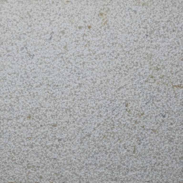Color/Finish variation image for Gray Limestone. The surface finish shown is bush hammered. The dominant color shown is gray. The color mix creates a cool feeling.