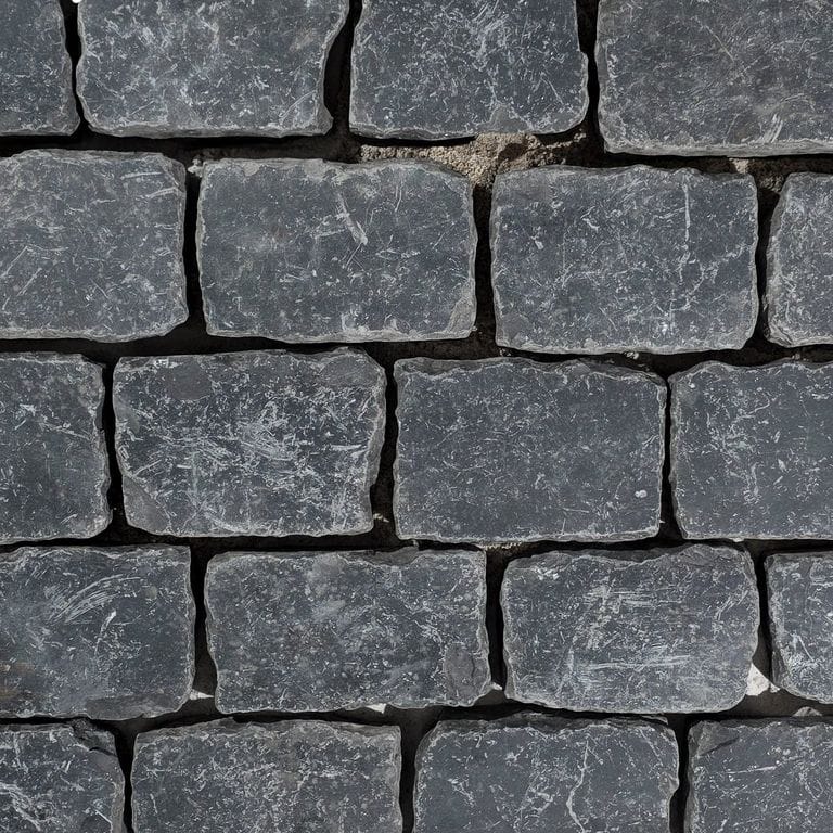 Color/Finish variation image for Reclaimed Basalt Cobblestones. The surface finish shown is . Dominant colors shown are black and gray. The color mix creates a cool feeling.