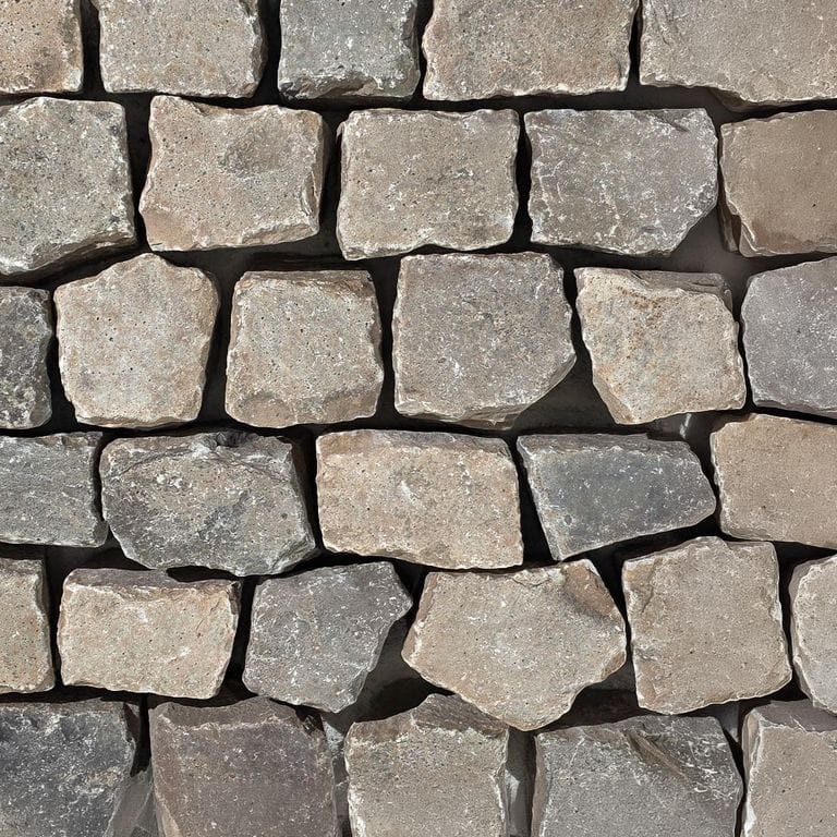 Color/Finish variation image for Reclaimed European Cobblestones - Mid German Mix. The surface finish shown is . Dominant colors shown are gray and tan. The color mix creates a warm feeling.