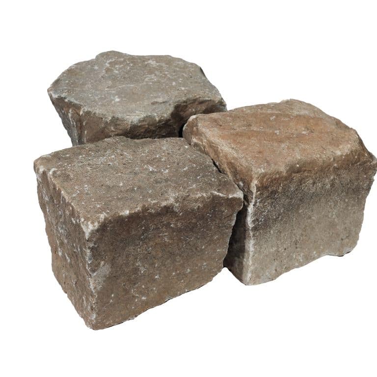 Oblique image for Reclaimed European Cobblestones - Mid German Mix. The surface finish shown is . Dominant colors shown are brown and tan. The color mix creates a warm feeling.