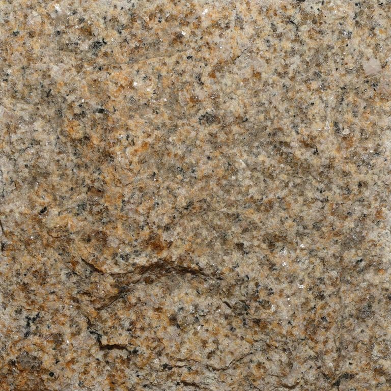 Color/Finish variation image for Amber Granite. The surface finish shown is split-face. Dominant colors shown are brown and tan. The color mix creates a warm feeling.