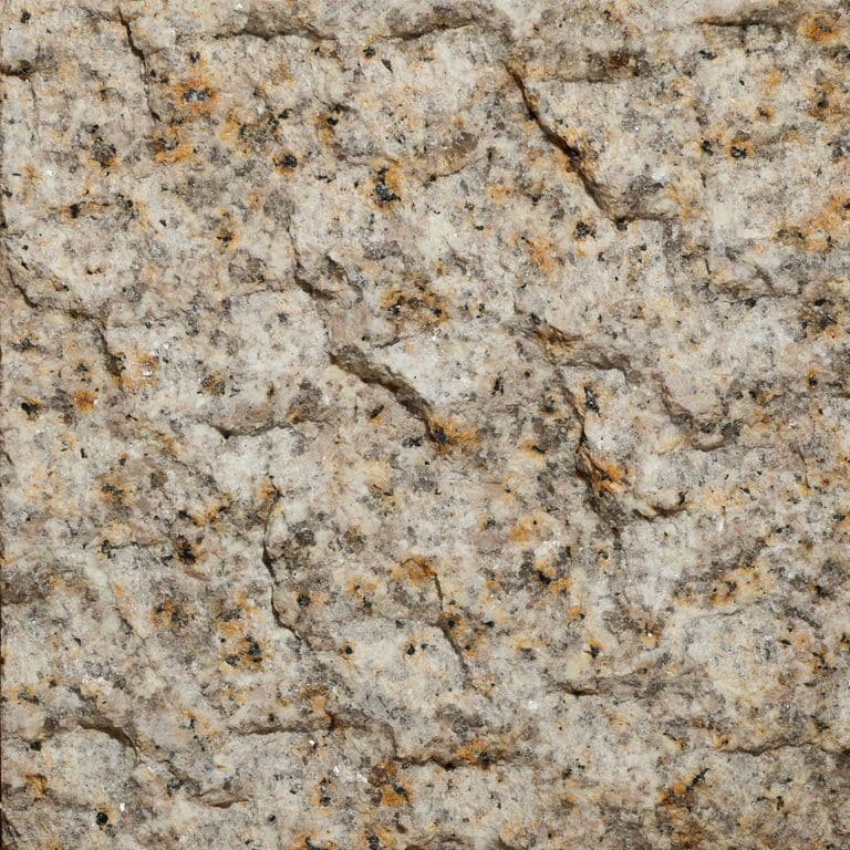Color/Finish variation image for Amber Granite. The surface finish shown is pineapple. Dominant colors shown are brown, yellow and tan. The color mix creates a warm feeling.