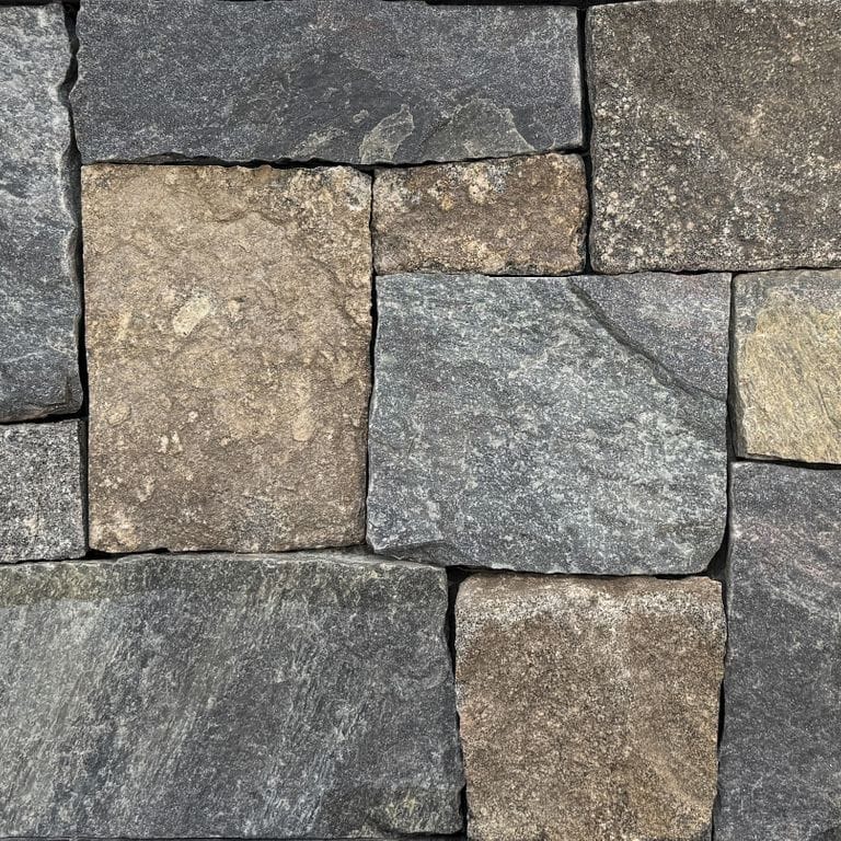 Feature image for Lake Korynth Fieldstone Blend. The surface finish shown is split-face. Dominant colors shown are gray and tan. The color mix creates a warm feeling.